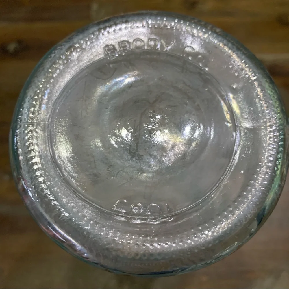 Clear glass floral vase with etched design